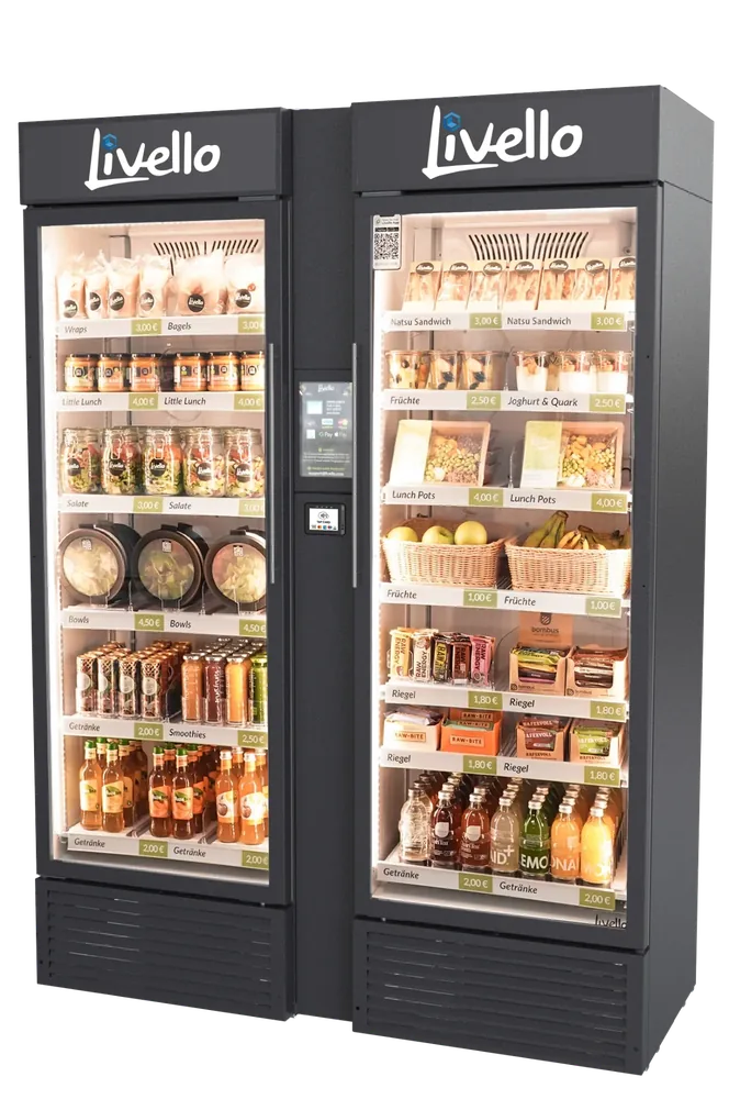 Livello Smart Fridge: zwei Glastüren, gefüllt mit Wraps, Salaten, Bowls, Sandwiches, Früchten und Getränken